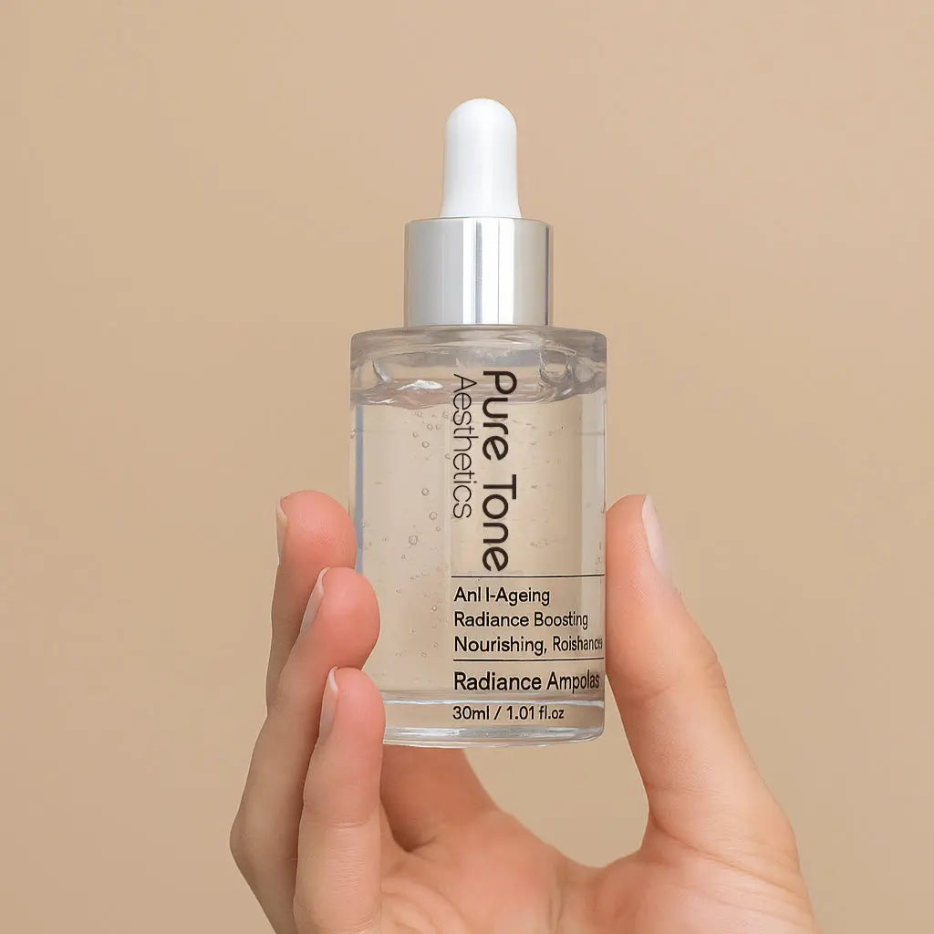 Hand holding a Pure Tone Skincare dropper bottle against a beige background