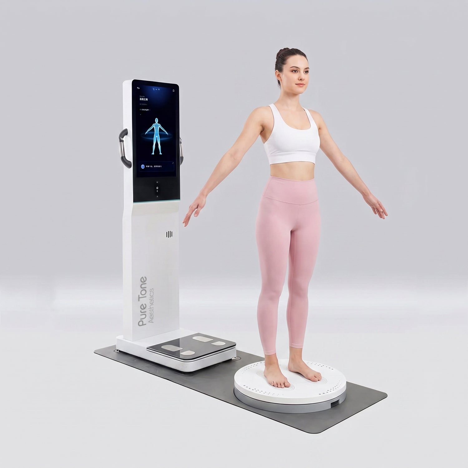 Client standing on the Morphiq platform during a 3D body composition scan
