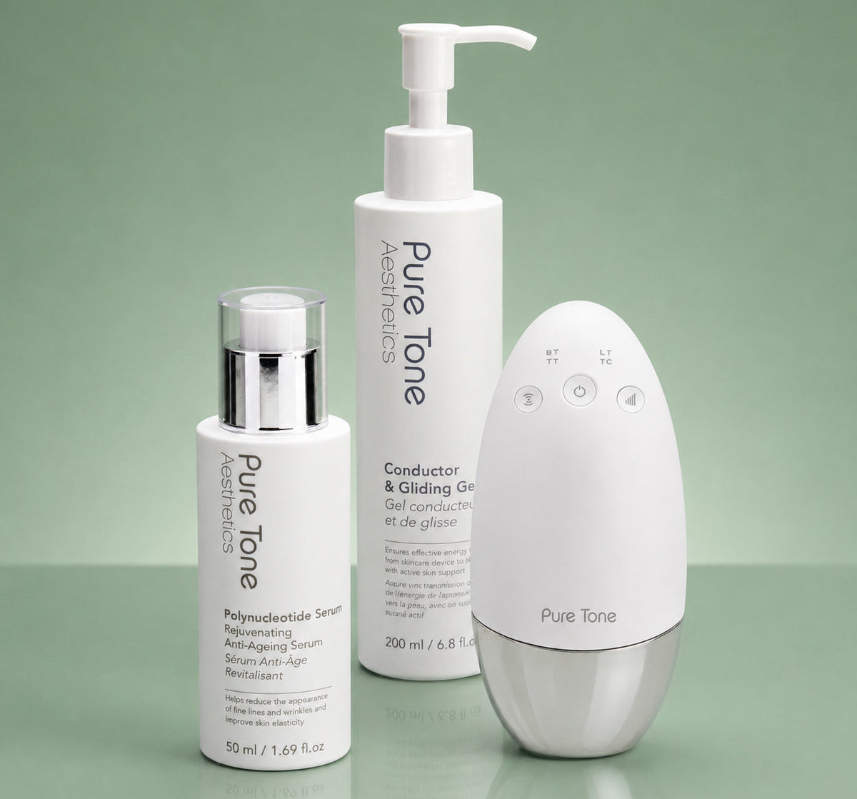 Pure Tone Aesthetics Conductor & Gliding Gel, Polynucleotide Serum and Radiance Pod photographed together on a soft green background.