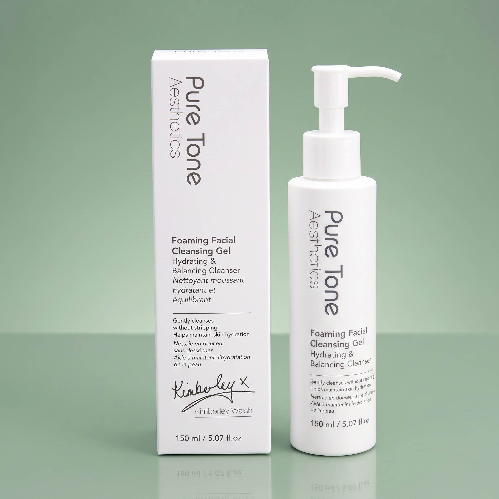 Pure Tone Aesthetics Foaming Facial Cleansing Gel bottle and gift box on a reflective soft green surface