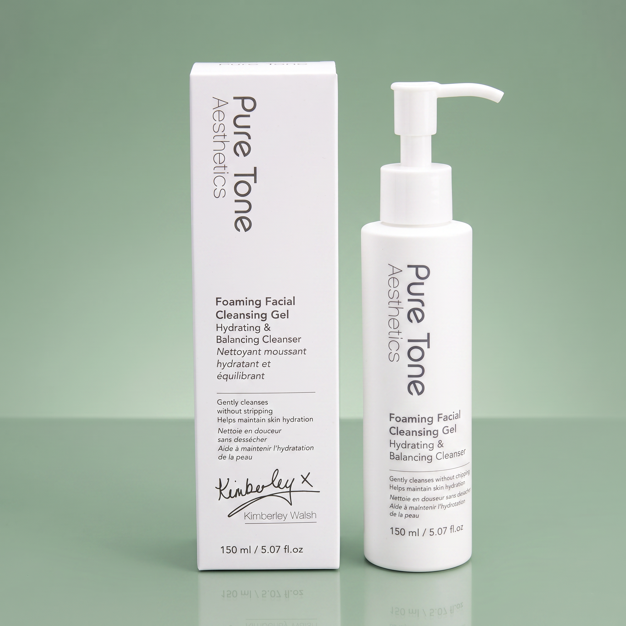 Pure Tone Aesthetics Foaming Facial Cleansing Gel bottle and gift box on a reflective soft green surface