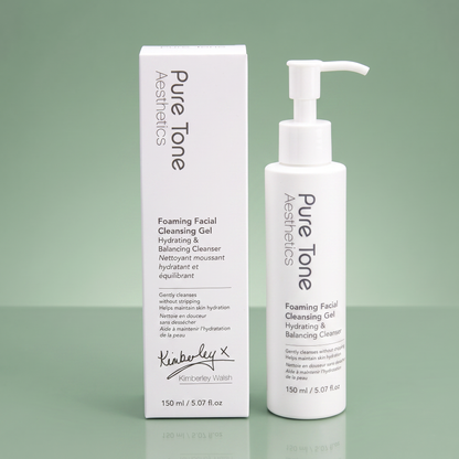 Pure Tone Aesthetics Foaming Facial Cleansing Gel bottle and gift box on a reflective soft green surface