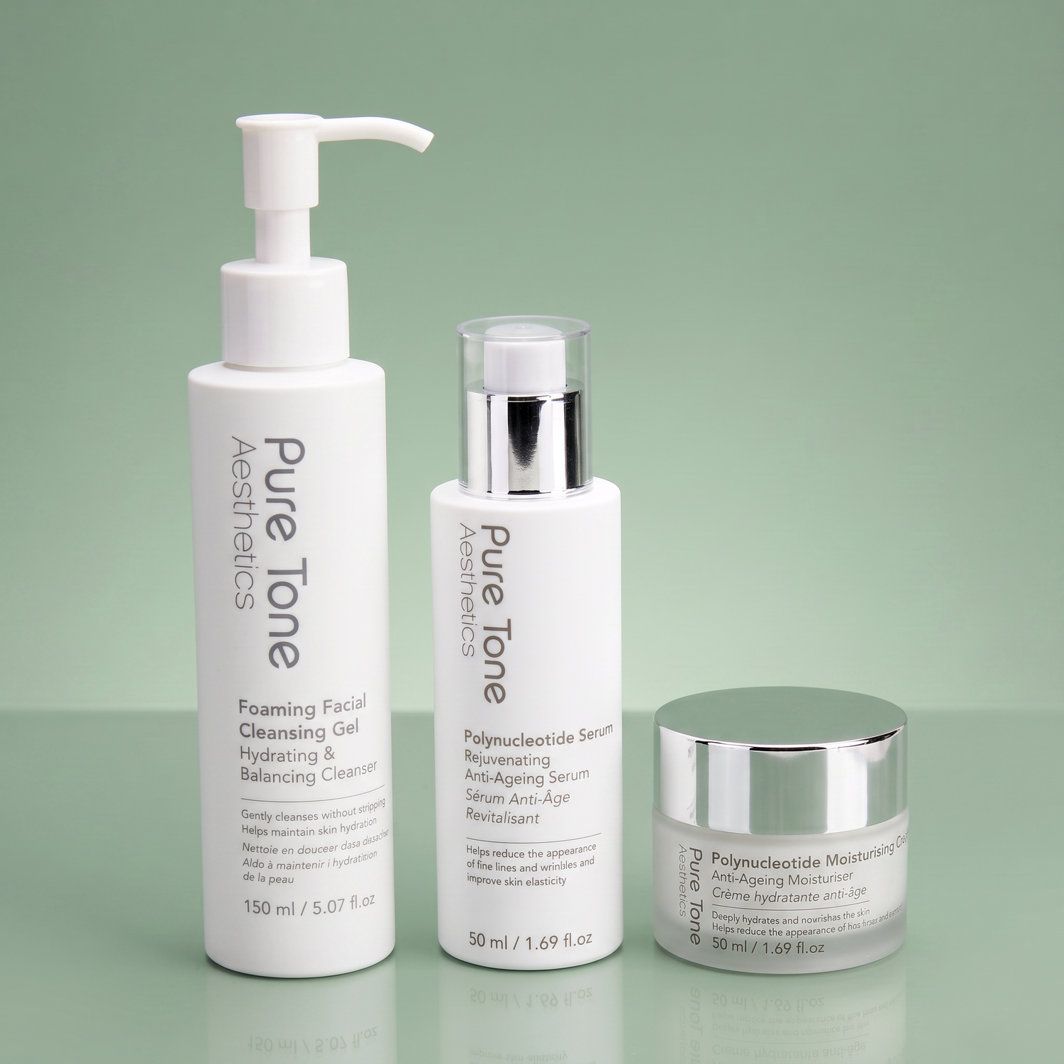 Pure Tone Aesthetics Foaming Facial Cleansing Gel, Polynucleotide Serum and Polynucleotide Moisturising Cream on a reflective soft green surface