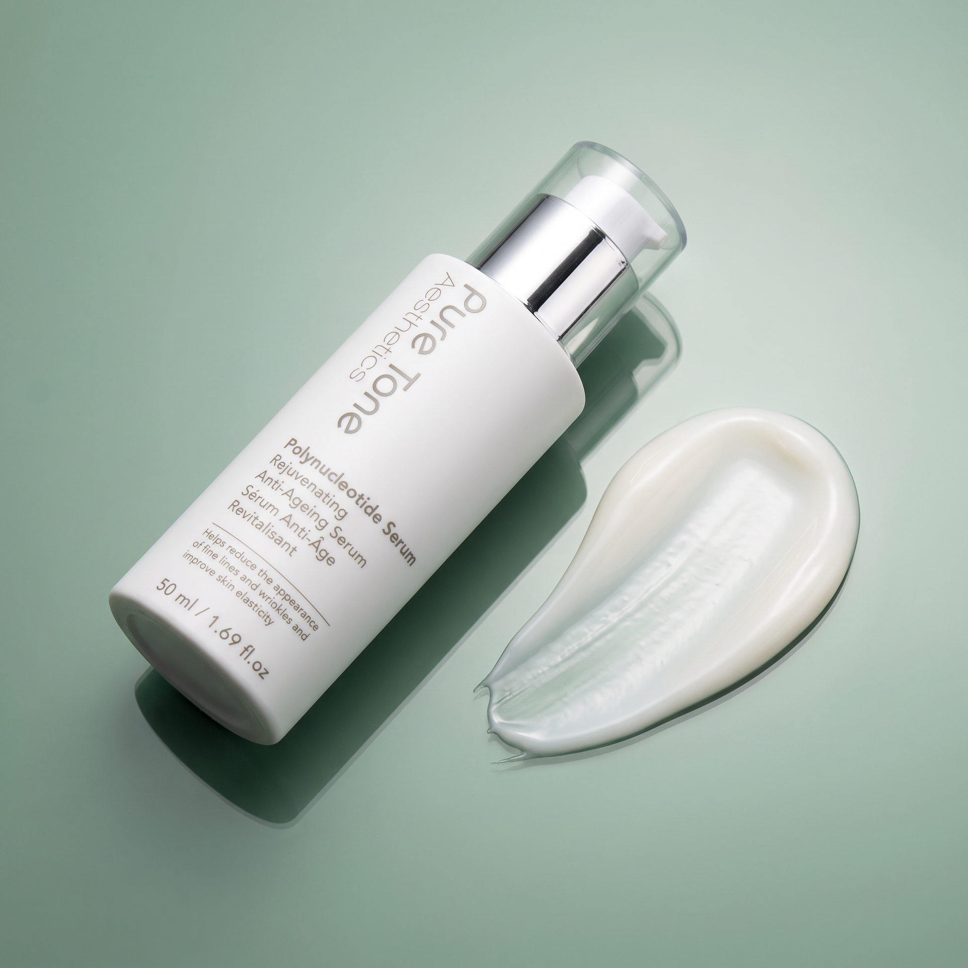 Pure Tone Polynucleotide Serum with Creamy Serum Smear on Soft Green Surface
