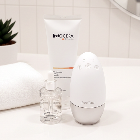 Radiance Pod, Radiance Ampoule and Face-up gel on a bathroom counter with a plant in the background